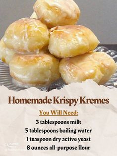 a pile of doughnuts sitting on top of a glass plate