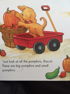 a children's book with an image of a dog pushing a wagon full of pumpkins