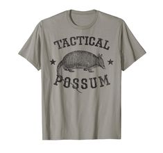 a gray shirt with an armadius on it that says,'practical possum '