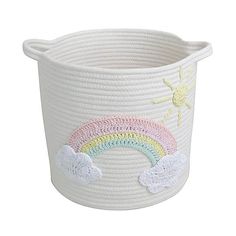 a white basket with a rainbow painted on it