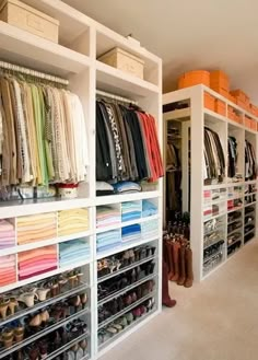 the closet is filled with lots of clothes and shoes for all kinds of people to wear