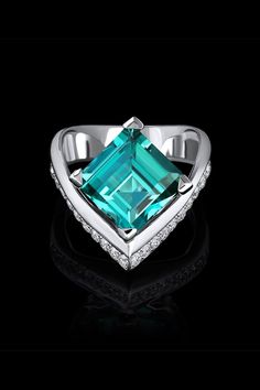 Voila Tourmaline ring features a magnificently cut blue/green tourmaline in high polish white gold, accented by pavé set diamonds. Luxury Tourmaline Ring Jewelry, Fine Jewelry Tourmaline With Brilliant Cut, Indicolite Tourmaline