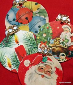 three christmas ornaments with santa clause on them