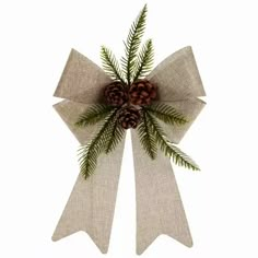 a christmas bow with pine cones and evergreen needles