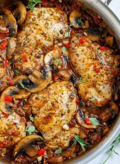 chicken with mushrooms and peppers in a pan