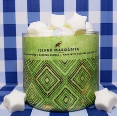 a green and white container filled with marshmallows