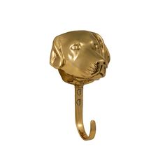 a gold dog head hook on a white background