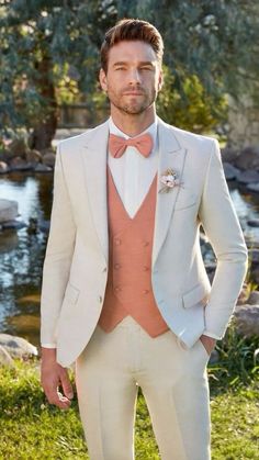 a man in a suit and bow tie