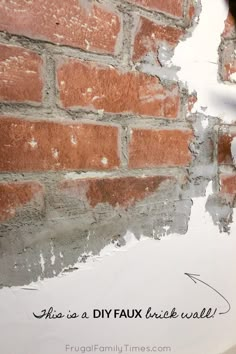 a brick wall that has been painted white with the words diyfaux stuck on it