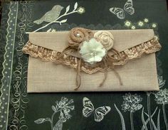 a piece of cloth with flowers and lace on it