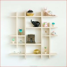 a white shelf filled with lots of different items