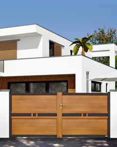 a modern house with wood and white exterior