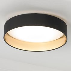 a black and white circular light fixture