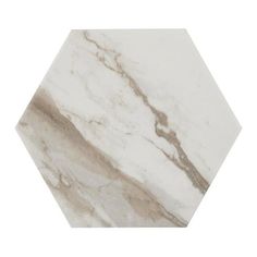 a marble hexagonal table top with white and brown accents