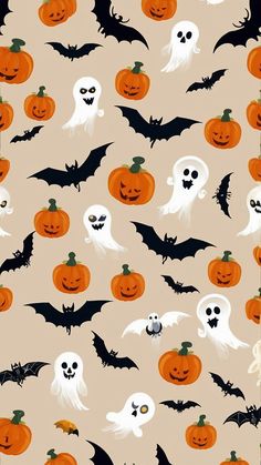 halloween pumpkins and ghost faces on a beige background