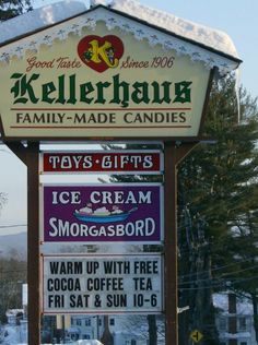 a sign advertising ice cream and coffee in the snow