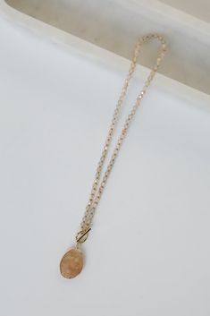 Pair your fanciest looks with the Alexis Natural Beaded Gemstone Necklace and you'll have everyone talking! This cute necklace features a beaded chain with a gemstone charm on the end. Style the Alexis Necklace with any outfit to instantly upgrade your look! Gold Plated Beaded Gemstone Charm Toggle Closure One Size | Length 9” Sneaker Heels Wedges, Cute Necklaces, Fall Flannel, Casual Bodysuit, Necklace Cute, Upgrade Your Look, Rust Dress, Cute Necklace, Custom Hats