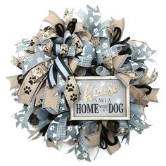 a dog themed wreath with the words house is not a home without a dog