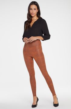 A coated finish and Lift Tuck® technology makes these inky skinny leggings a most flattering and stylish choice for almost any occasion. 26 1/2" inseam; 9" leg opening; 11 1/2" front rise; 16 1/2" back rise (size Medium) Pull-on style 80% polyester, 20% elastane Dry clean or machine wash, line dry Imported Women's Clothing Contemporary Accessories, Concert Looks, Legging Pants, Empowering Women, Sweaters And Leggings, Double Knit, Comfortable Dress, Double Knitting, Summer Essentials