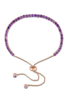 Rose gold plated prong set round cut purple amethyst adjustable bracelet. Sliding bead closure. Approx. 5-10" adjustable length. Approx. 2.8mm width. Imported Flower Diamond Ring, Slide Bracelet, Bolo Bracelet, Purple Bracelet, Tassel Bracelet, Amethyst Gold, Gold Plated Bracelets, Bracelet Crafts, Bracelet Gold