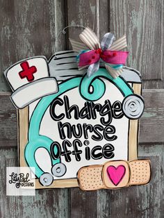 a plaque with the words change nurse office on it, and a stethoscope