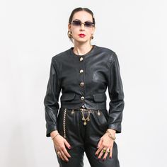 Vintage 80's genuine leather jacket in black - with a front button closure - lined - padded shoulders - materials: genuine leather SIZE from the tag: S MEASUREMENTS shoulder to shoulder: 18 inches (45 cm) bust circumference: 19 inches (48 cm) length: 19 inches (48 cm) sleeve length from the shoulder seam: 21.5 inches (55 cm) The model is 5'9" (174 cm), measures 35-27-38 (89-69-96 cm) and typically wears clothing in size M CONDITION - 9/10 - The jacket in good pre-owned vintage condition. Leather Jacket Cropped, Genuine Leather Jackets, Style Expert, Poland, Favorite Outfit, Black Women, Genuine Leather, Bathing Beauties, Jackets & Coats