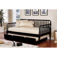 a day bed with pull out trundle in a living room