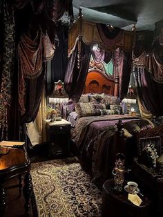 a bed with purple curtains and pillows in a room