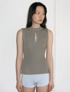 Knitted sleeveless top with zip and silicone label details. Knitted Sleeveless Top, Sustainable Fashion Designers, Outfit References, Paloma Wool, Clothing Pieces, Knit Fashion, Paloma, Workout Tops, Fashion Inspo Outfits