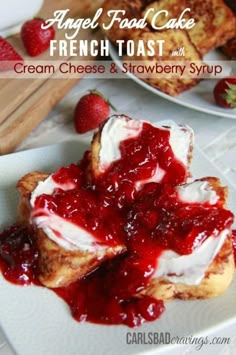 french toast with cream cheese and strawberry syrup is on a plate next to strawberries