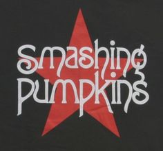 the smashing pumpkins t - shirt is black with red and white stars on it