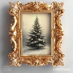 a christmas tree with lights in a gold frame