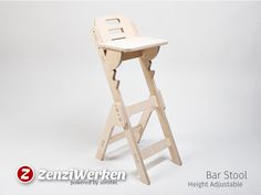 a wooden stool with a white seat on the top and bottom, in front of a gray background