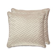 two beige pillows with diamond pattern on the front and back, one is made out of velvet