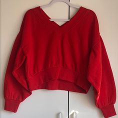 Never Worn! Cropped, Warm, Puffy Sleeve Sweater Can Be Worn Off The Shoulder 60% Cotton 40% Polyester Red Sweater For Spring Loungewear, Trendy Red Sweater For Loungewear, Red Trendy Sweater For Loungewear, Forever 21 V-neck Tops For Winter, Forever 21 V-neck Cotton Tops, Red Sweatshirt For Spring Loungewear, Trendy Forever 21 Loungewear Tops, Casual Forever 21 Tops For Loungewear, Casual Oversized Tops From Forever 21