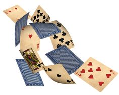 several playing cards with hearts and spades on them