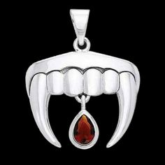 VAMPIRE TEETH  PENDANT - Sterling Silver 925 with blood red garnet dropper.  Rooted in mythology across cultures, vampires have a blood lust that embodies vitality, desire, and passion, and have captured human fear and imagination for centuries... Measures 2.6 cms wide. Comes in free gift box. By Peter Stone - the world's leading manufacturer of sterling silver Wiccan and Pagan jewellery. Peter Stone, Vampire Teeth, Pagan Jewelry, Blood Red, Red Garnet, Dracula, Sterling Silber, Free Gift, Silver 925