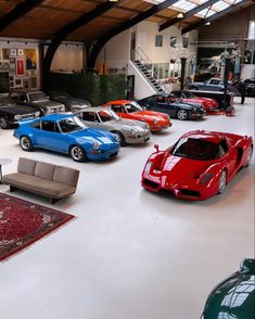 a room filled with lots of different colored cars