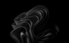 an abstract black and white image with wavy lines in the shape of waves on a dark background