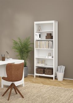 a white bookcase sitting on top of a wooden floor next to a desk and chair