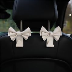 two bows on the back of a car seat