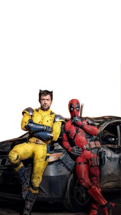 two deadpools sitting on top of a car