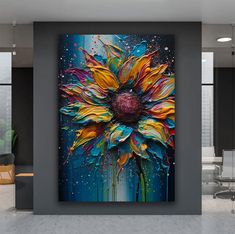 an abstract painting of a sunflower on a gray wall in front of a blue background