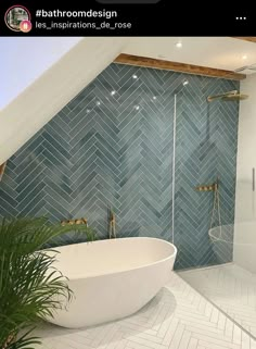 a bathtub and shower in a bathroom with blue tiles on the walls, flooring and ceiling