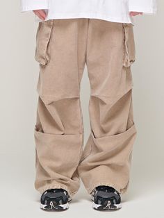 This is a casual and comfortable work pants that is made out of high quality cotton 100% denim fabric. With design detail of cargo pockets on the side, pin tuck detail on the knee and semi wide silhouette, it gives a comfortable and trendy mood.- Semi wide silhouette- Pigment denim fabric- Double pin tuck on the knee- Triple stitches detail Baggy Cotton Cargo Jeans With Pockets, Beige Streetwear Bottoms With Multiple Pockets, Beige Streetwear Pants With Pockets, Beige Patch Pockets Pants For Streetwear, Beige Cargo Jeans With Patch Pockets For Streetwear, Beige Parachute Pants With Hip Pockets For Streetwear, Beige Streetwear Pants With Patch Pockets, Baggy Khaki Cargo Jeans For Workwear, Trendy Khaki Cargo Jeans With Hip Pockets