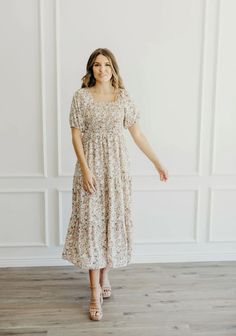 Floral print midi dress with smocked stretchy bodice, bubble elastic sleeves, elastic neckline, elastic waistband, tiered skirt and side pockets.

Wash inside out on cold gentle.

Aprox. measurements in inches:

XS:Length-47.5 |Bust-26 |Waist-22

S:Length-48 |Bust-28 |Waist-24

M:Length-48 |Bust-30 |Waist-26

L:Length-48 |Bust-32 |Waist-28

XL:Length-49 |Bust-34 |Waist-30

Modest boutique, Modest boutique dresses, Modest dress boutique, Modest dresses for women, Modest dress boutique’s online, Trendy modest clothing, Modest clothing for women, Modest dresses for church, Modest dress, Modest dress boutiques, Modest pretty dresses for women, Modest shop, Shop modest dresses, Casual modest dresses, LDS Temple Dresses, modest dresses for woman