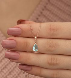 Blue Aquamarine Stone Water Drop Silver Necklace ♥ ✔️Metal Used: 925 Sterling Silver ✔️Weight : 2,20 Gr ✔️Figure Width: 0,60 Cm ✔️Figure Height: 1,00 Cm ✔️Chain Length : 42 Cm ✔️Stone Type : Aquamarine ✔️Coating : Rose Gold Plated ⚠️Care: It does not darken as long as contact with substances such as Perfume, Water, Alcohol, Cream, Bleach is avoided. -NRZ1092 Chic Cheap Blue Necklaces, Wedding Day Necklace Brides Aquamarine, Affordable Blue Everyday Necklace, Affordable Blue Crystal Necklace Gift, Cheap Handmade Light Blue Jewelry, Necklace For Prom Blue, Chic Affordable Blue Necklace, Cheap Blue Drop Jewelry, Cheap Blue Everyday Necklace