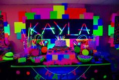 a birthday party with neon colors and decorations