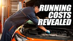 a man working on an orange car with the words running cost revealed