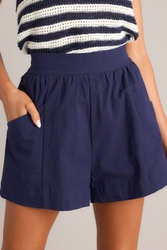 Get ready to lounge in style with our Cotton Cloud Navy Cotton Blend Shorts! These shorts offer ultimate comfort and breathability for all-day wear. Perfect for a day at the beach or a casual day out. these shorts are a must-have addition to your summer wardrobe. Stay cool. comfortable. and trendy in the Cotton Cloud shorts! These navy shorts feature a high waisted design. a thick waistband. an elastic insert at the back of the waist. and functional hip pockets. 97% Cotton. 3% Spandex Hand Wash Cold Lined 100% Polyester Imported Model is wearing a size small Sorority Rush Dresses, Cotton Clouds, Rush Dresses, Cardigan Crop Top, Cardigan Crop, Dress Bra, Friend Outfits, Day At The Beach, Long Crop Top